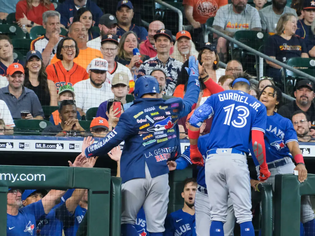 Even Astros fans couldn't help but smile as George Springer celebrated his home run — putting on the Blue Jays' home run jacket — in his return to Minute Maid. (Photo by F. Carter Smith)
