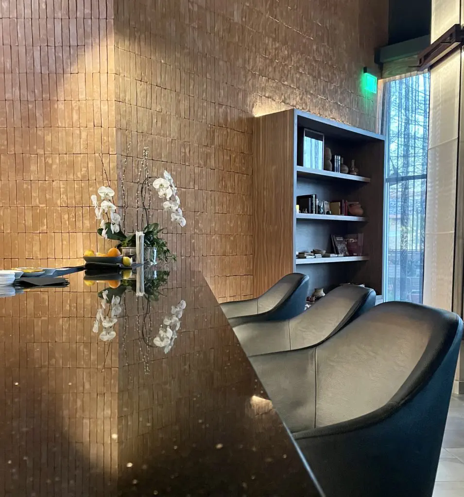 The bar at Don Artemio has a view of stacked Saltillo brickwork. (Photo by Courtney Dabney)