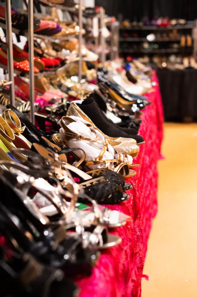 Teens select from a large variety of shoes to match their prom gown. (Photo by Sara Blair Design Photography)