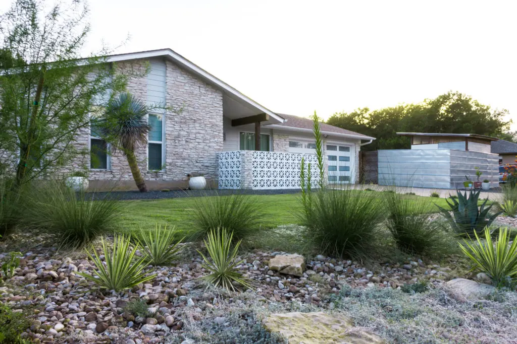 Landscaping for this midcentury modern dwelling in Garrison Park was done by Native Edge Landscape. 