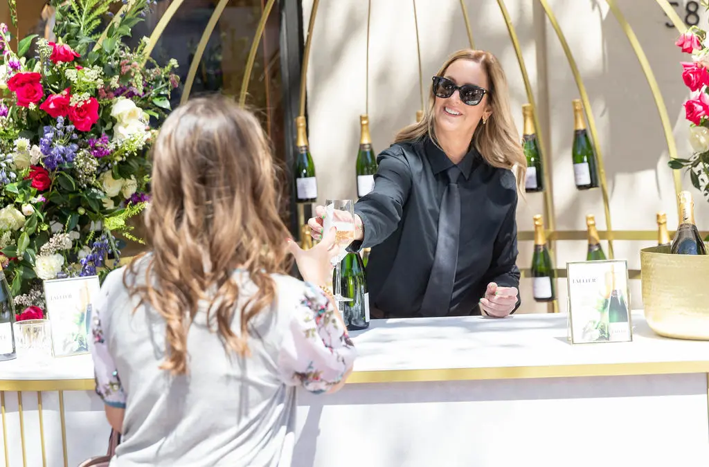 Bubbles fueled the day's spring shopping.  (Photo by Grant Miller)