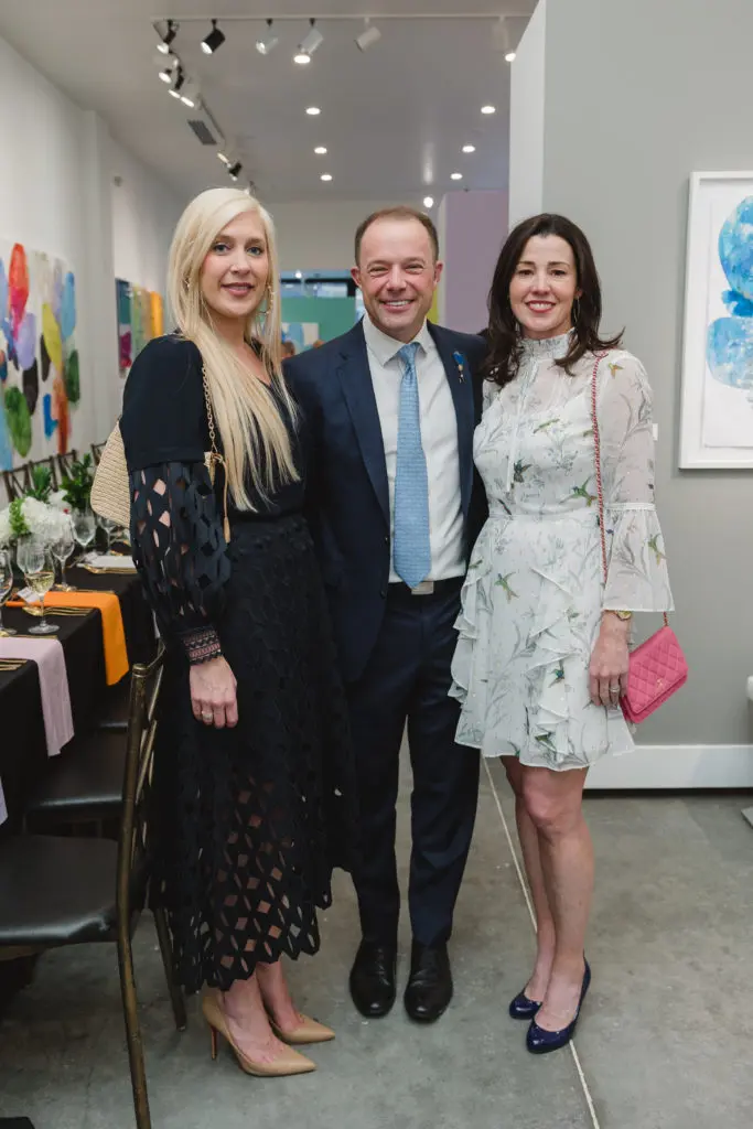 Genevieve Carter, William and Adrienne Vanderbloeman.