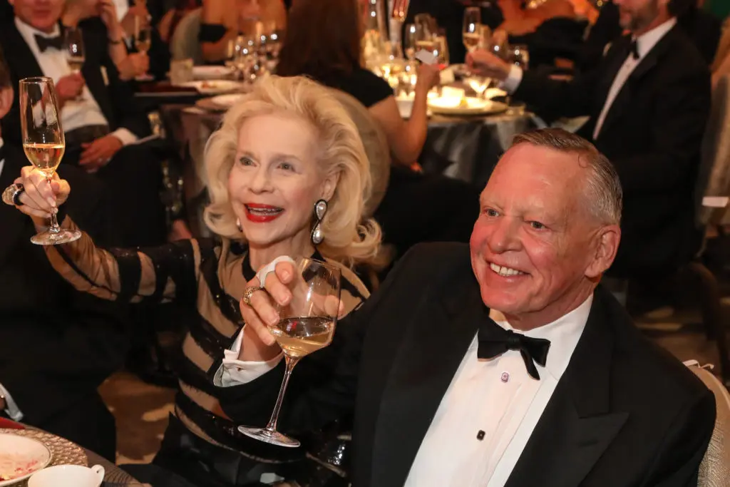 Champagne toasts to Lynn Wyatt and Richard Flowers at the Alley Theatre 75th anniversary gala in 2022 (Photo by Priscilla Dickson)