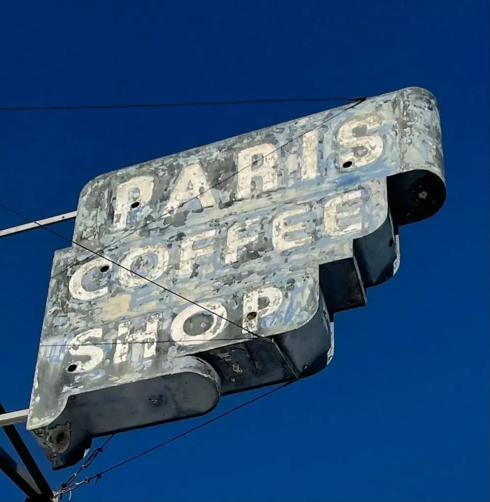 The Paris Coffee Shop signage is being restored with neon.