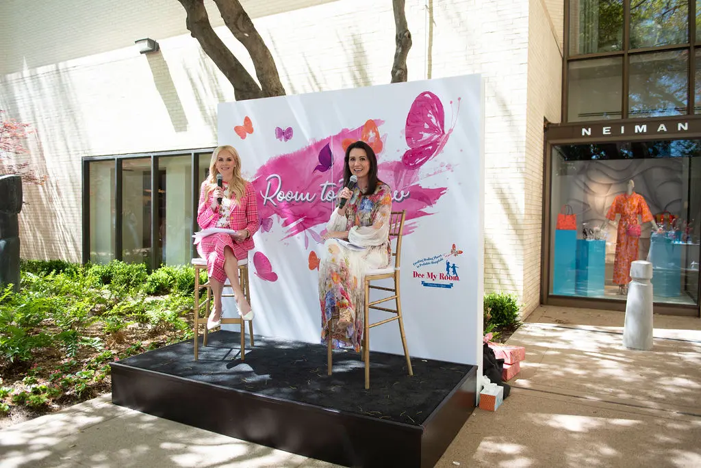 Presenters Kameron Westcott and Kimberly Schlegel Whitman on stage (Photo by Tamytha Cameron)