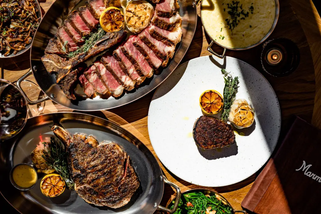From top- A 42oz Porterhouse, Right: 8oz Beef Tenderloin, Bottom: 18oz Cowboy Ribeye served at the new Marmo Italian restaurant and chophouse. (Photo by Kirsten Gilliam)