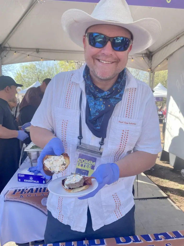 Wade Chappell presents Pearl Snap Kolache's burger entry. Photo by Courtney Dabney.