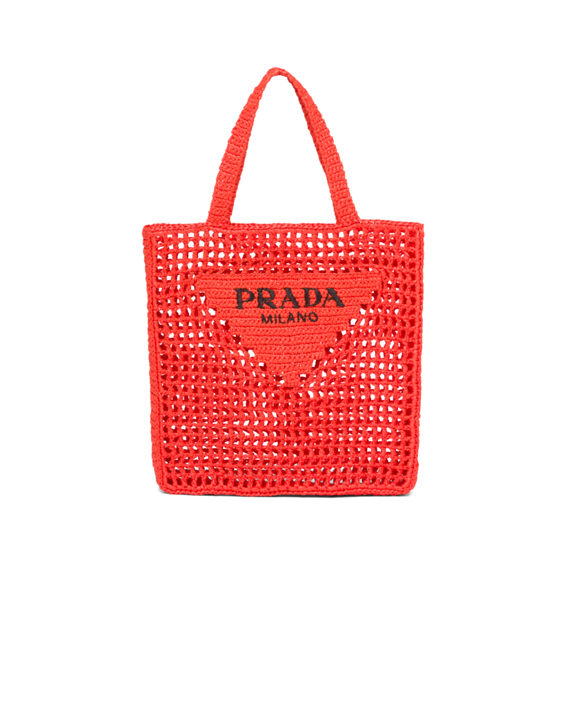 Prada raffia red tote bag, $1,690, available at Neiman Marcus NorthPark and Prada.com