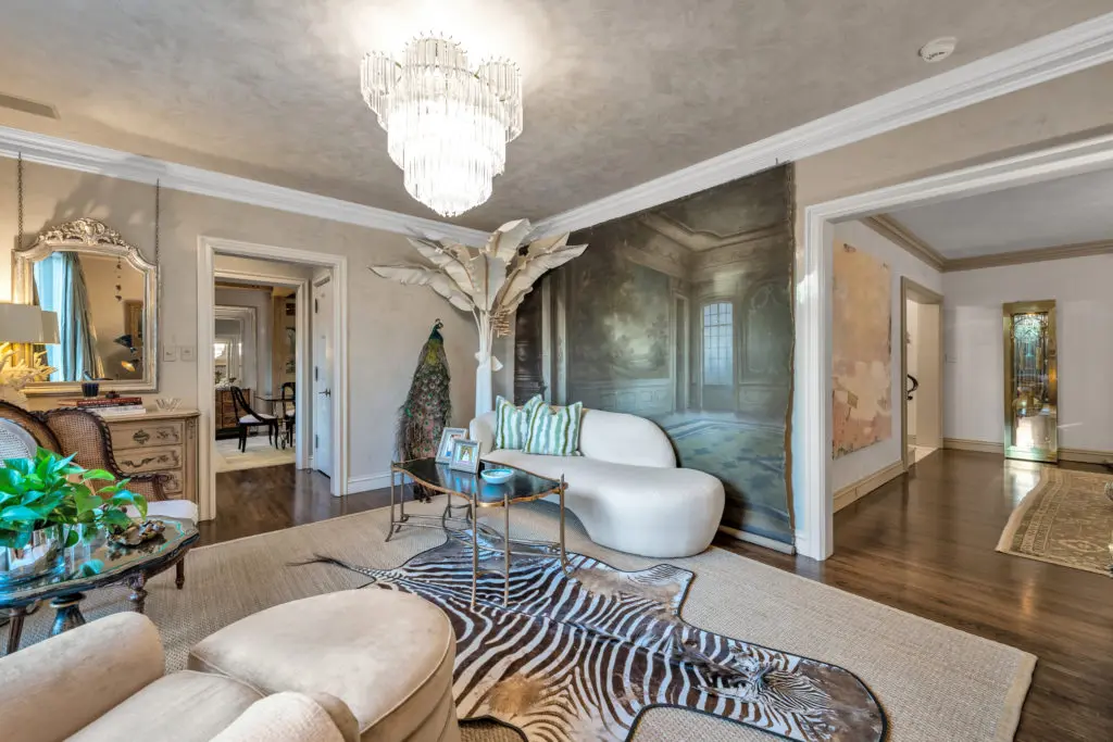 Cozy sitting room is filled with designer flourishes.