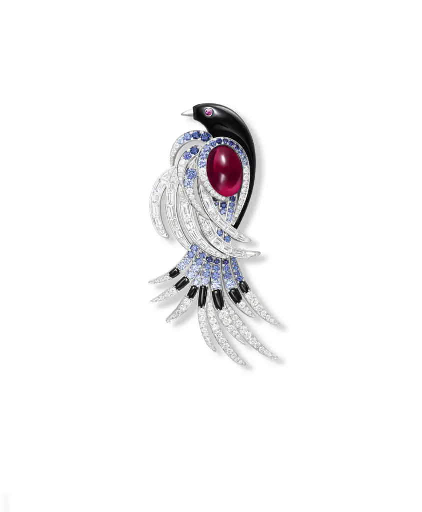 Harry Winston Blue Magpie brooch from the Marvelous Creations Collection with cabochon tourmaline, blue sapphires, rubellite, and diamonds, set in platinum.