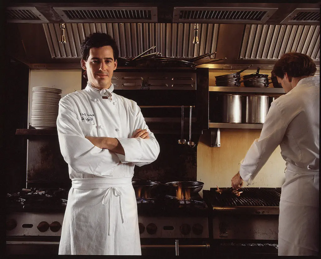 Del Grande in his Cafe Annie kitchen, 1982
