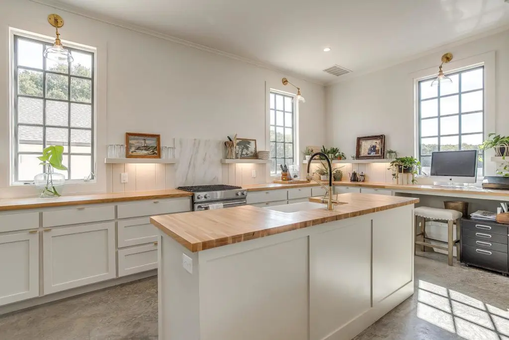 A second full kitchen makes entertaining easy at the guest home.