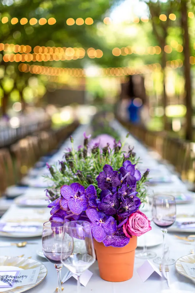 For the occasion, the lush Nasher gardens featured two long farm tables lined with French-inspired florals by Bryan Long of Grey Gardens Florist. (Photo by Tamytha Cameron, Nate Rehlander, and Hal Samples)