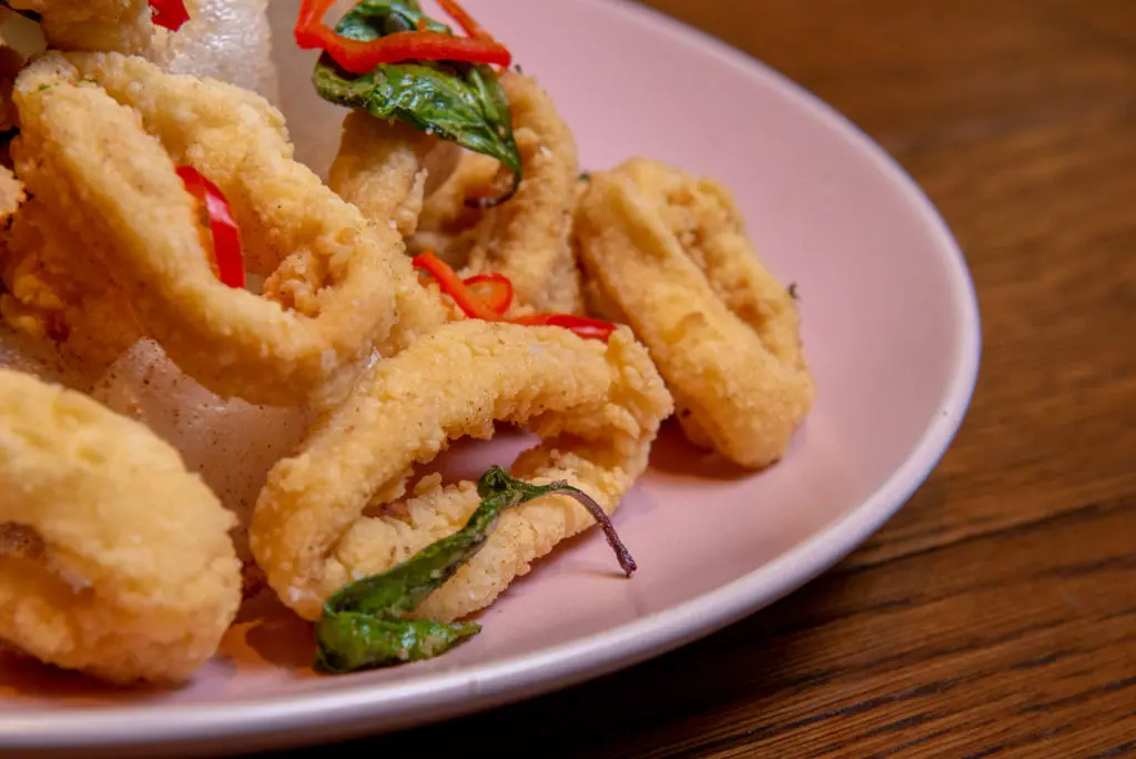 Calamari (Adobong Pusit) at Soy Pinoy, the Filipino cuisine restaurant at The POST Houston. (Photo by Kat Ambrose)