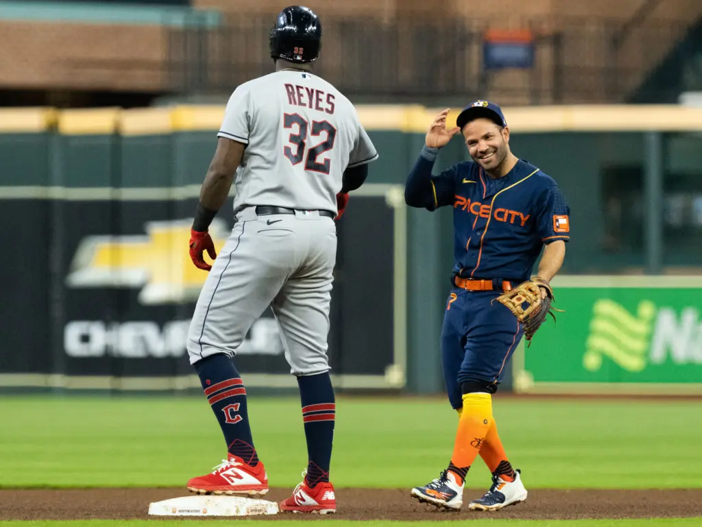 Franmil Reyes and Jose Altuve caught up at second base. (Photo by F. Carter Smith)