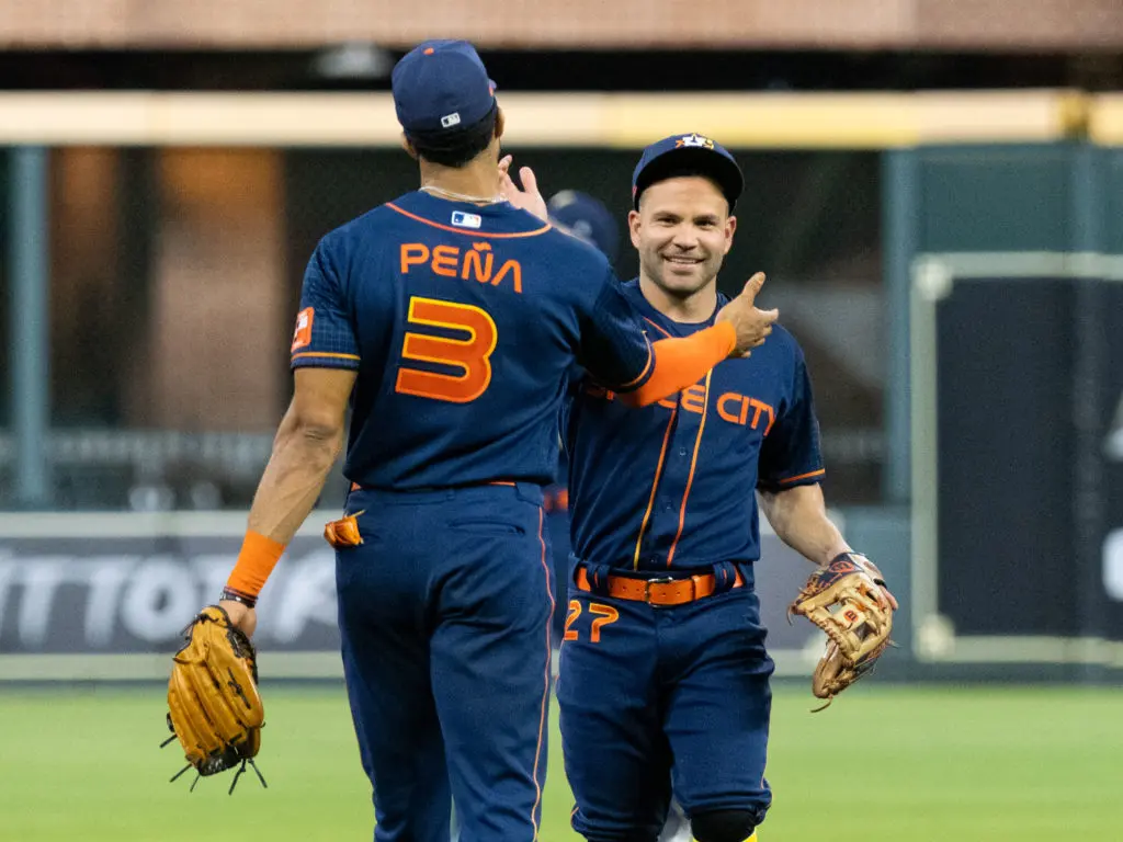 Jeremy Pena and Jose Altuve are getting used to having postgame celebrations together. (Photo by F. Carter Smith)