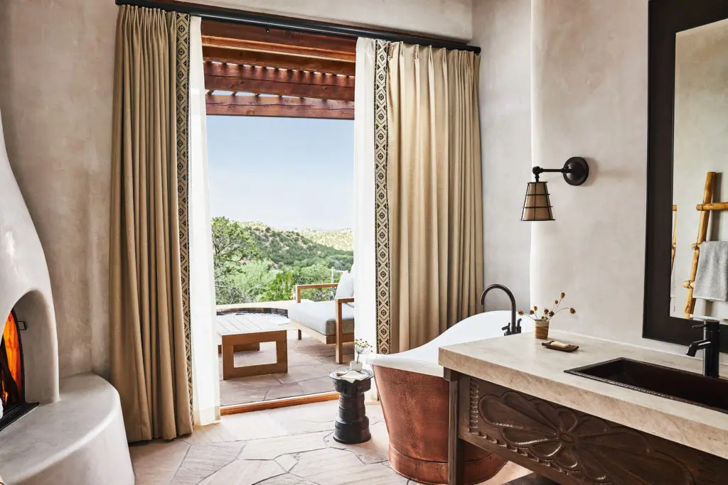 A hammered bronze tub in the Kiva Suite.  (Photo by Auberge Resorts Collection)