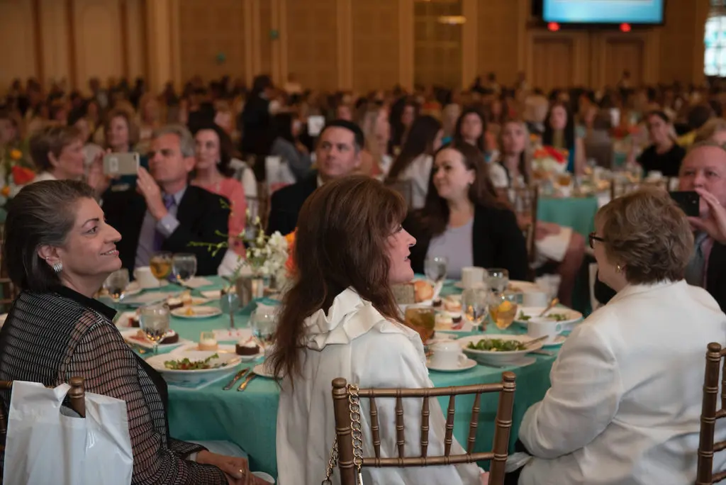 Candid photo from the Junior League of Dallas Centennial Milestones  Luncheon. (Photo by Tamytha Cameron)
