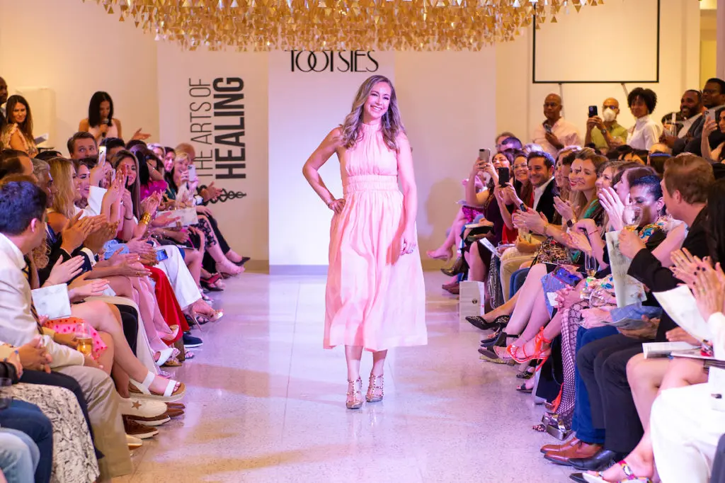 Dr. Kristi Hustak on the catwalk at The Art of Healing Foundation event at Tootsies (Photo by Jacob Powers)