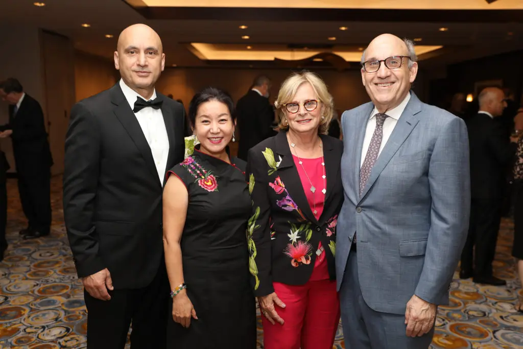 Dr. Soner Tarim & Nancy Li-Tarim, Joy & Benjamin Warren at the Lyndon Baines Johnson Moral Courage Award dinner (Photo by Priscilla Dickson)