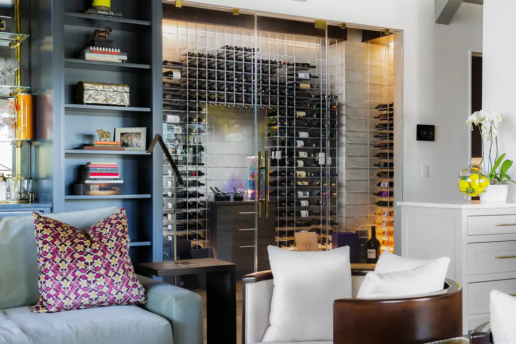 The great room living area at 8 Oaks in the Texas Hill Country provides ample wine storage (Photo courtesy of Douglas Elliman Real Estate)