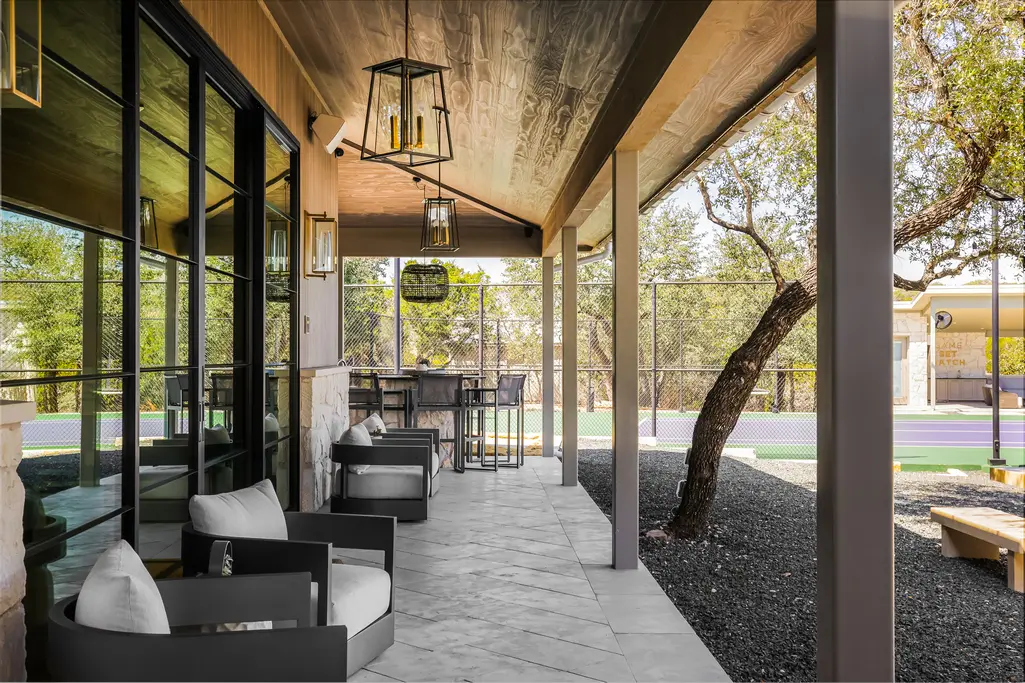 Verandas flank the main house at 8 Oaks in the Texas Hill Country  (Photo courtesy of Douglas Elliman Real Estate)