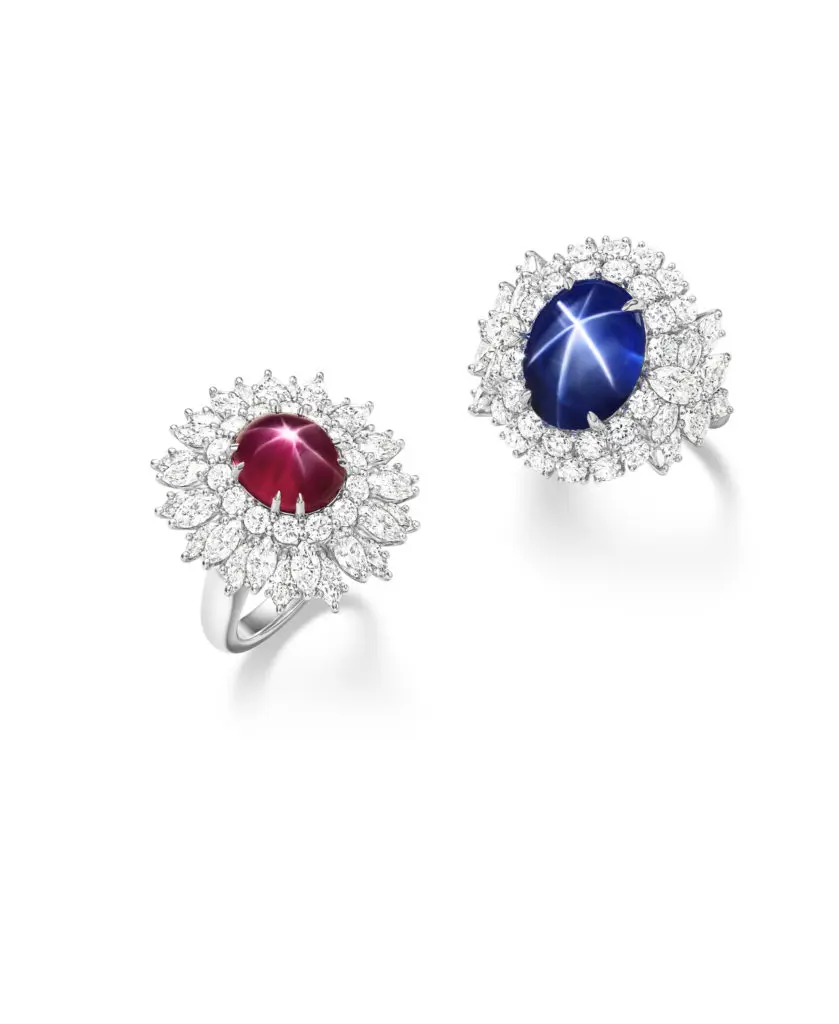 From left: Harry Winston Star Ruby ring from the Marvelous Creations Collection with 4.91-carat star ruby and round brilliant and marquise-shaped diamonds, set in platinum. Star Sapphire ring with 6.82-carat oval cabochon star sapphire center stone and marquise and round brilliant diamonds, set in platinum.