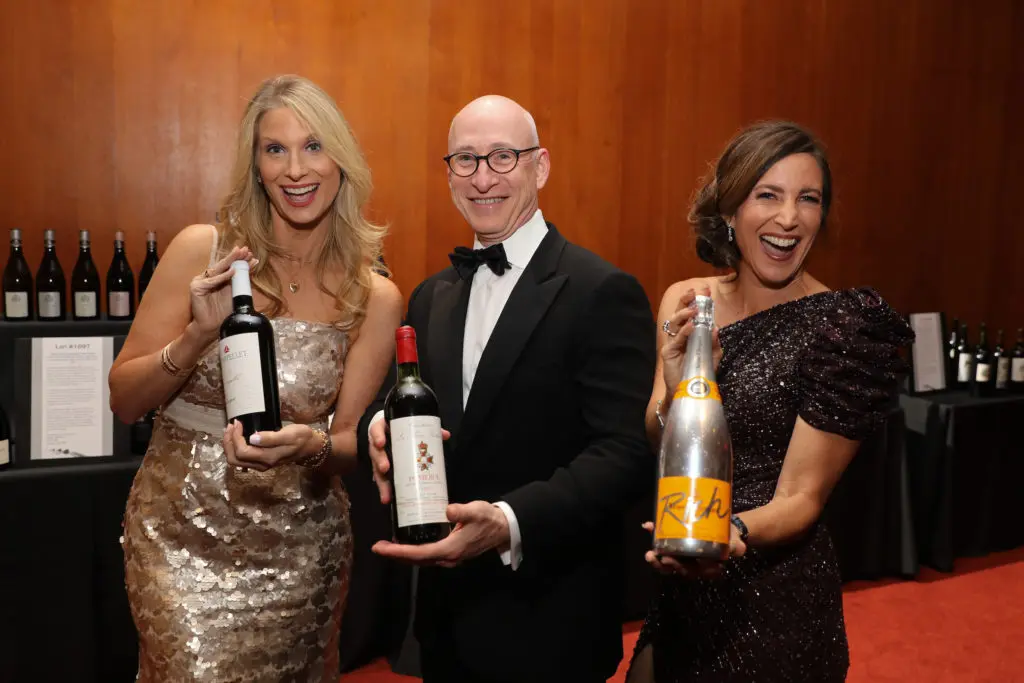 Kelly Hess, Evan & Carin Collins at the Houston Symphony Wine Dinner and Collector's Auction (Photo by Priscilla Dickson)