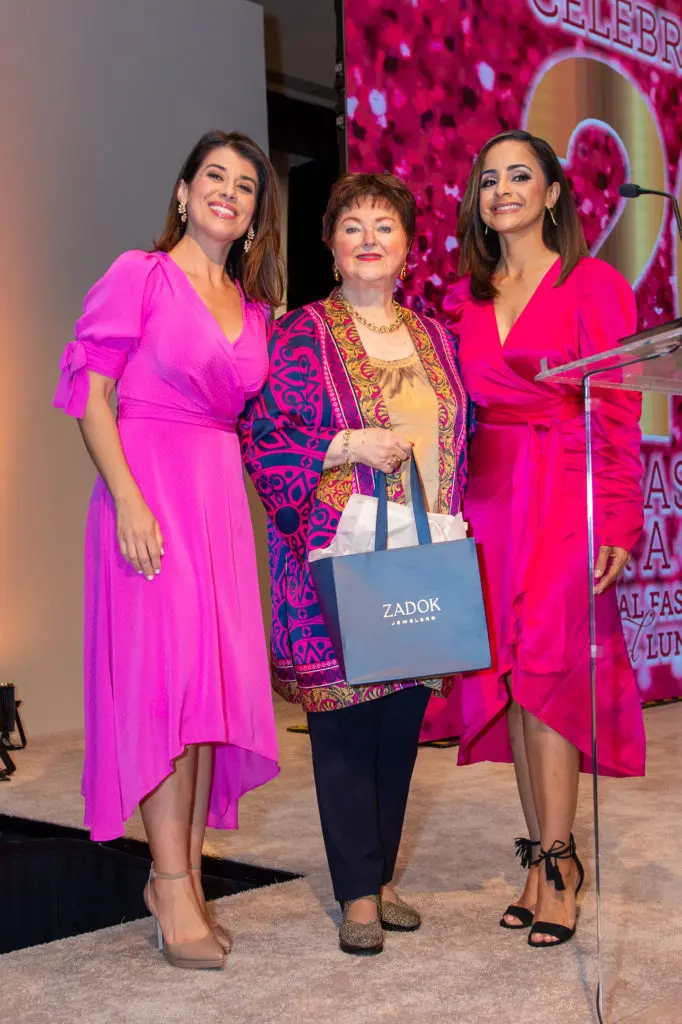Emcees Lisa Hernandez and Crystal Ayala flank Zadok Jeweler's Helene Zadok who presented the diamond necklace to the raffle winner. (Photo by Jacob Power)