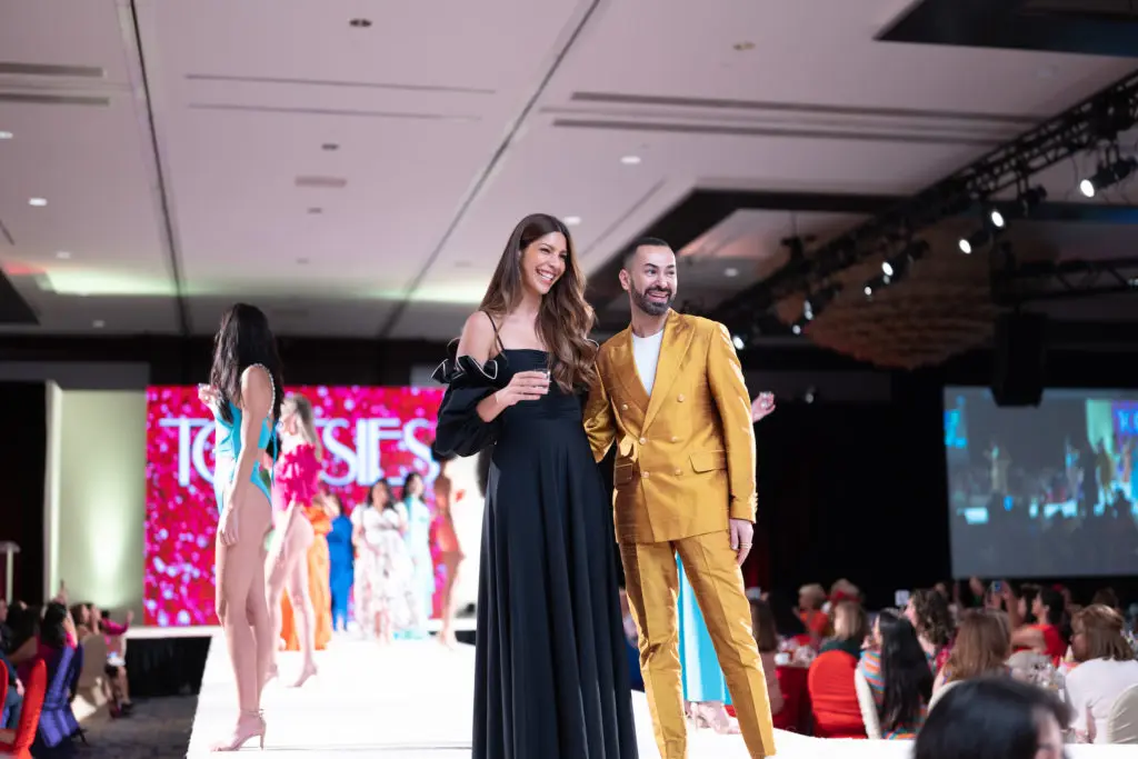 Colombian designer Maygel Coronel and Tootsies Creative Director Fady Armanious with tequila toasts at the conclusion of the Latin Women's Initiative 20th anniversary luncheon. (Photo by Daniel Ortiz)