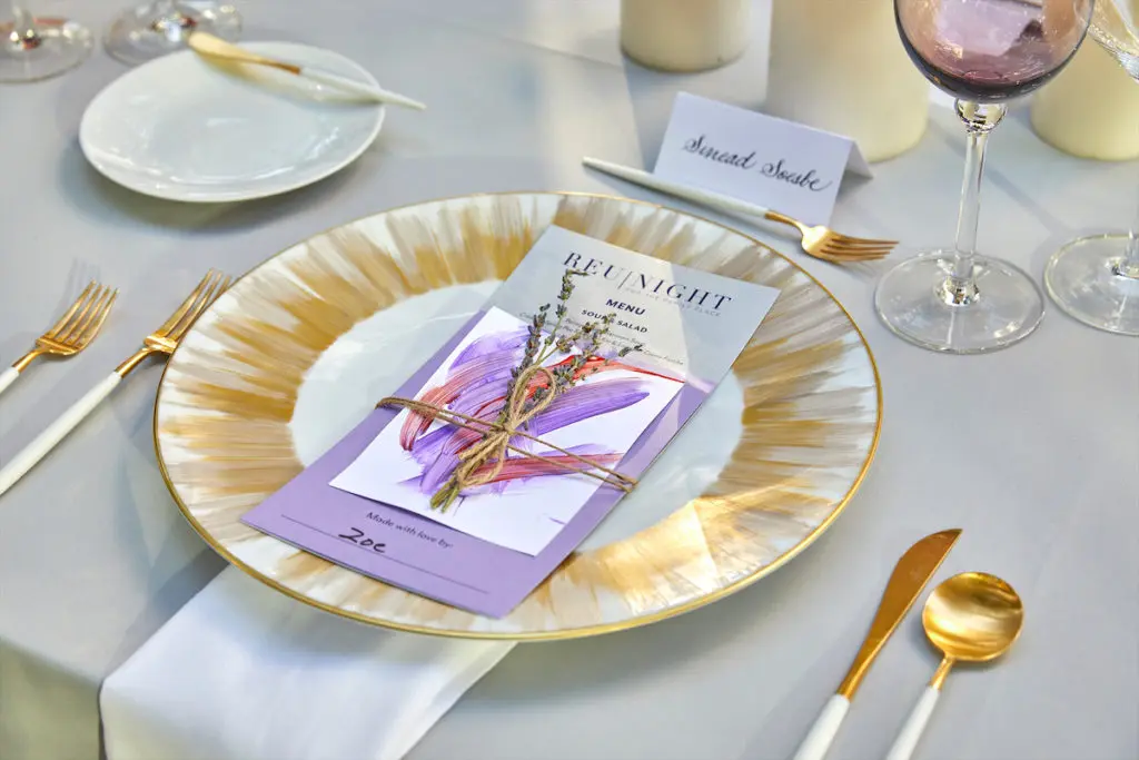 At each place setting, guests found a bundle of lavender and a small piece of handmade art made by a child at The Family Place. (Photo by Tamytha Cameron, Nate Rehlander, and Hal Samples)