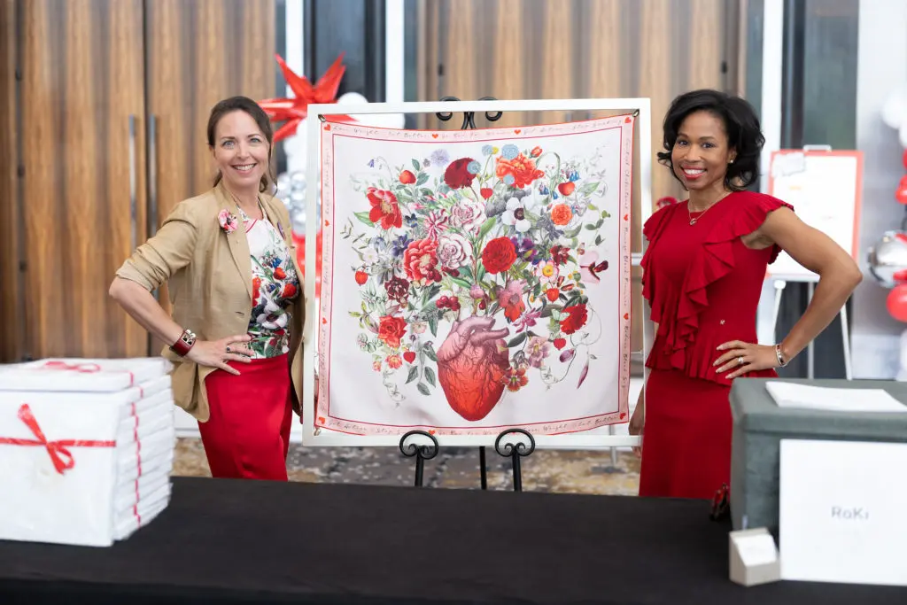 Roki Design's Kimberly Phipps-Nichol and Roslyn Bazzelle Mitchell at the American Heart Association 'Go Red for Women' luncheon (Photo by Daniel Ortiz) 