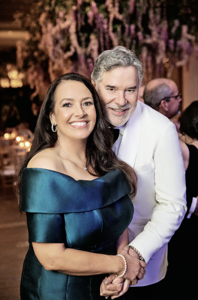 The groom’s parents Stacy and Keith Barker (Photo by John Cain Photography)
