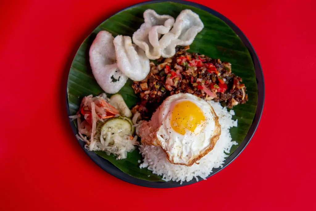 Pork Sisig With Fried Egg at Soy Pinoy at The POST Houston. (Photo by Kat Ambrose)