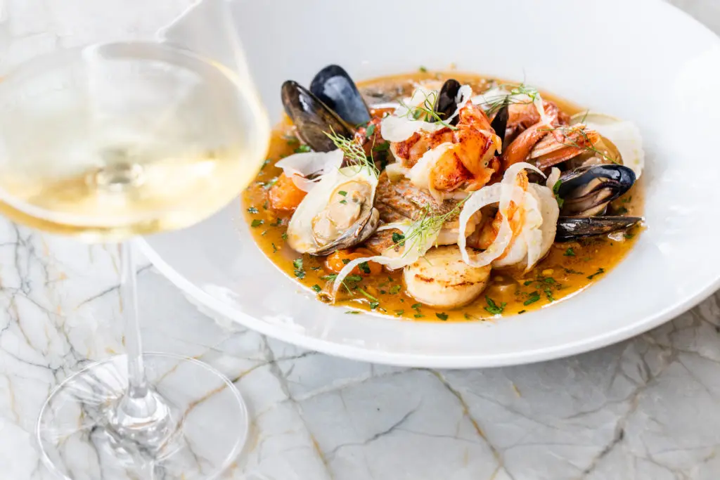 Executive chef Jesus "JB" Babaran's new dishes at Tonight & Tomorrow include Cacciucco, a melange of seafood stewed in a tomato and red wine broth. (Photo by Rebecca Wright)