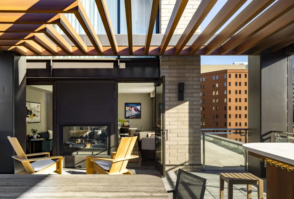 The Thompson Suite at Thompson Denver has its own patio balcony overlooking the Rocky Mountains. (Photo by Julie Soefer)