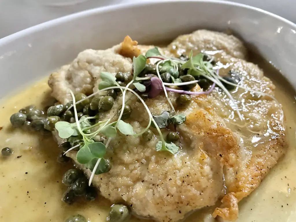 Dreamy, lemony chicken piccata from Tre Mogli. Photo by Courtney Dabney.