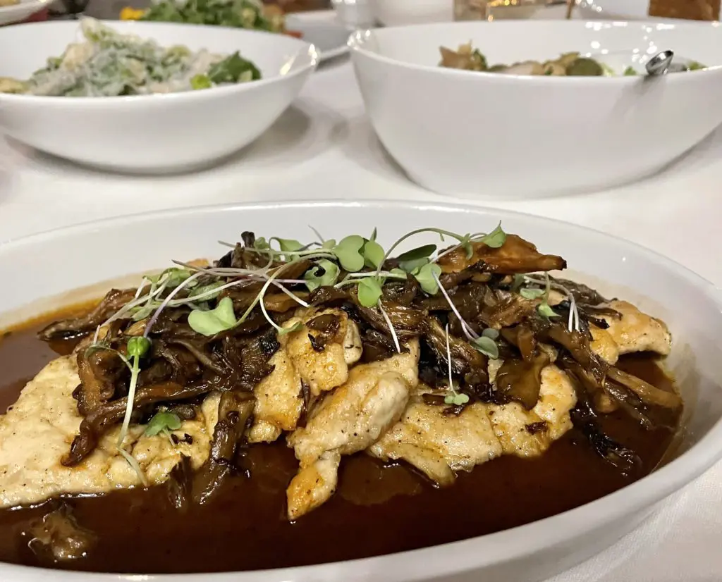 Many dishes like the chicken marsala can be served family style at Tre Mogli. (Photo by Courtney Dabney)