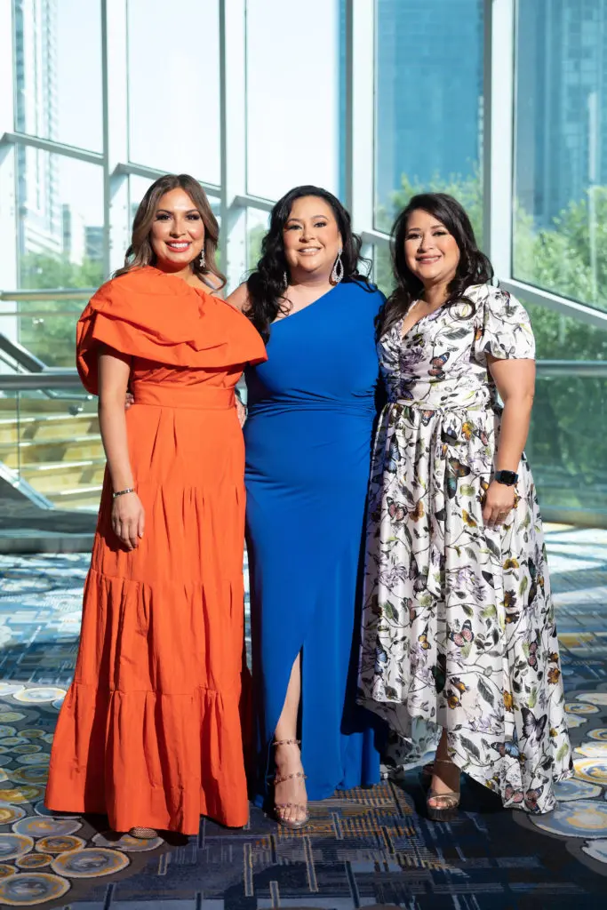 Latin Women's Initiative 20th anniversary luncheon chairs Vicky Dominguez and Patricia Garcia flank LWI president Vicki Luna. (Photo by Daniel Ortiz)