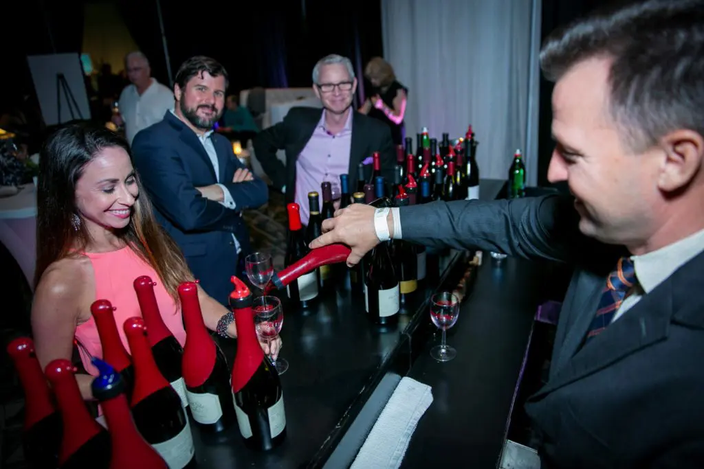 Some of the happy party revelers who enjoyed the past Wine and Food Week festivities.  (Courtesy of Food & Vine Productions)