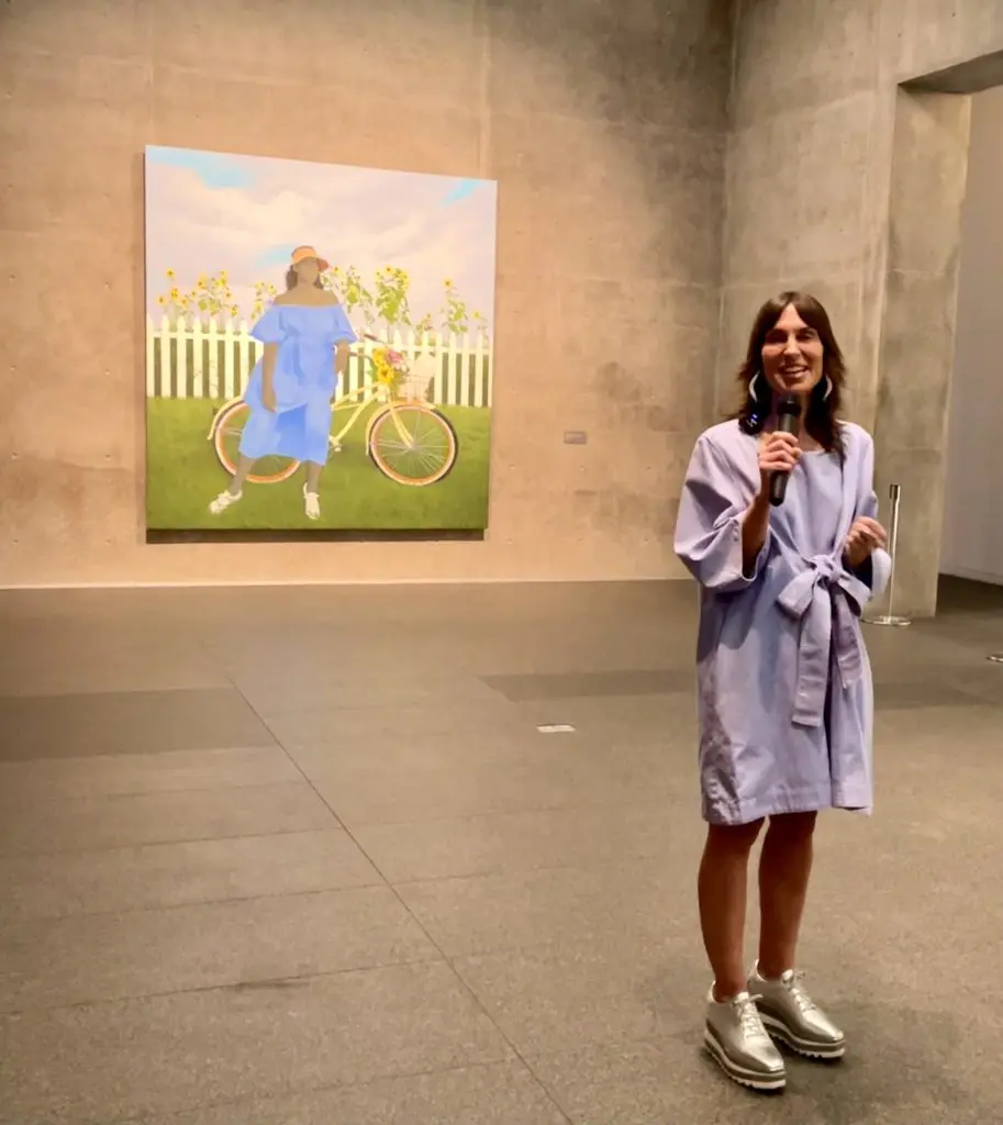 Chief Curator Andrea Karnes stands at the entrance to The Modern's new exhibit. Photo by Courtney Dabney.