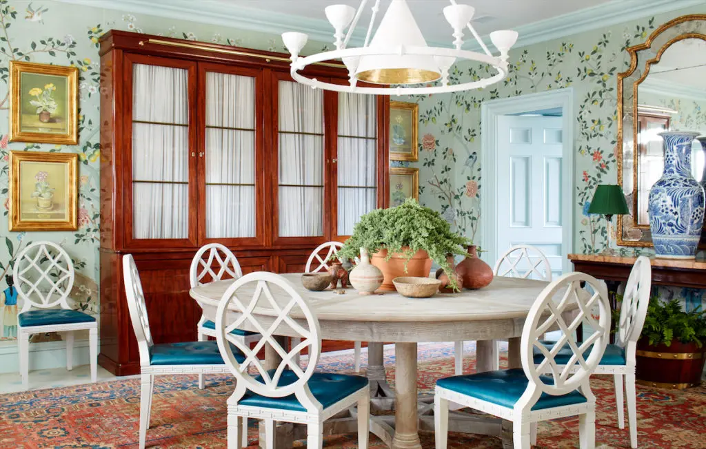 The dining room with de Gournay wallcovering and chairs from Miles Redd’s collection for Ballard Designs. (Photo by Trevor Tondro and Otto )