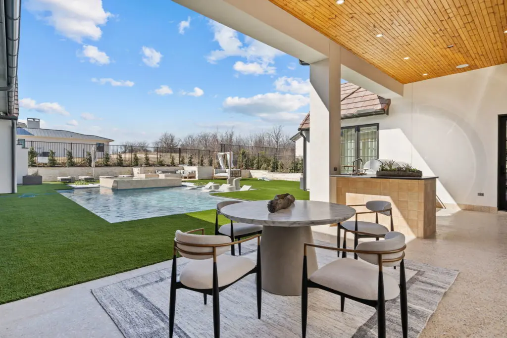 Outdoor living at its finest, and ease of maintenance with full turf grass.