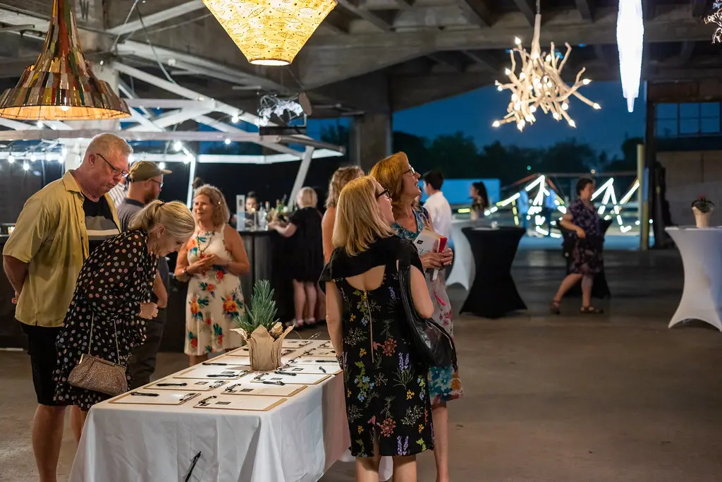 Guests take in the Wild Light fixtures (Photo by Alex Barber)