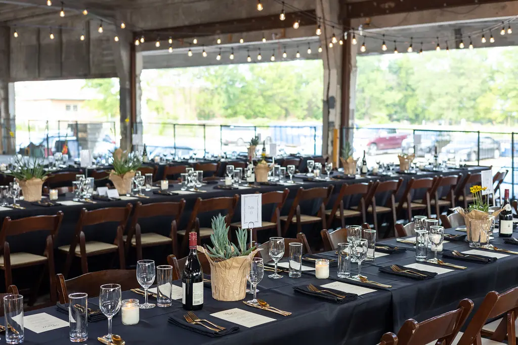Long, elegant dinner tables await guests (Photo by Alex Barber)
