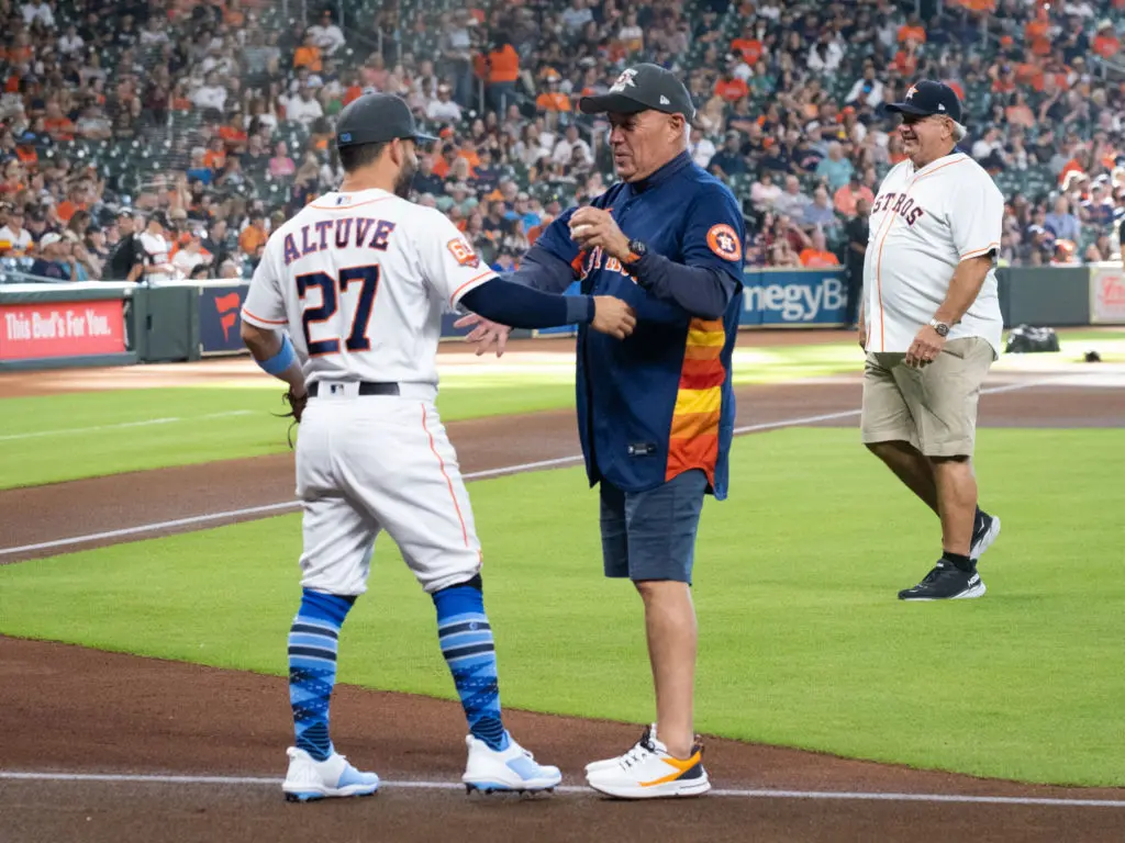 Jose Altuve and his dad Carlos Altuve enjoyed the Father's Day moment at Minute Maid. (Photo by F. Carter Smith)