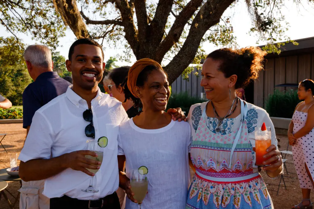 Chester Chambers, Adryn Mari, Karuna Diedericks at the Summer Soulstice Dinner. (Photo by Liz Silva)