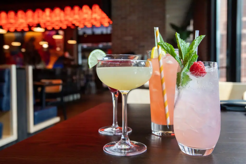 The mixology program at the Blue Sushi Sake Grill include the delicious the "Naked and Famous," cocktail mixed with Sombra mezcal, Aperol, yellow chartreuse and lime. (Courtesy of Flagship Restaurant Group)