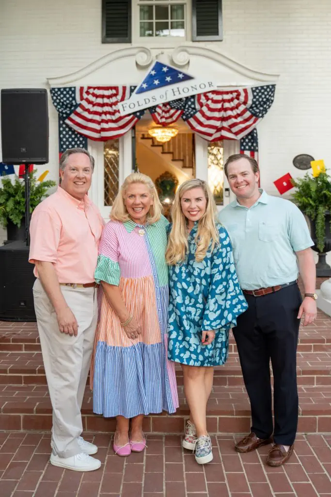 Folds of Honor kickoff party hosts and honary chairs Rusty and Molly Reid share a moment with Sainty Nelsen and Jake Reid. (Photo by Danny Campbell)