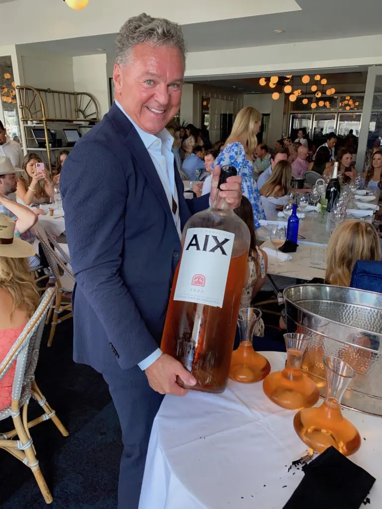 Brasserie 19 owner Charles Clark displays the Nebuchadnezzar (equal to 20 bottles) of rosé, a special for his Rosé All Day bash. (Photo by Shelby Hodge)